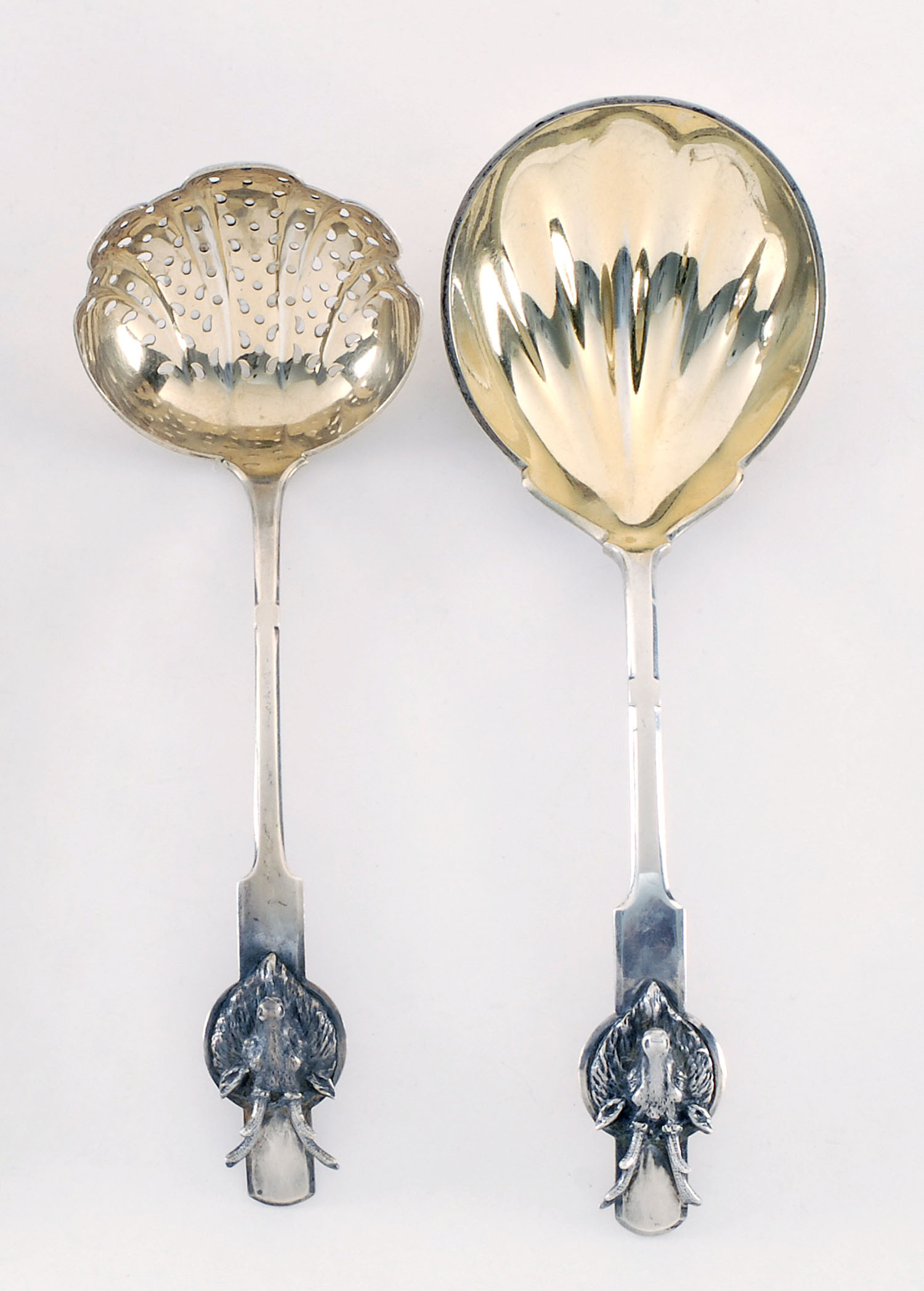 Appraisal: AMERICAN SILVER SUGAR SIFTER AND BERRY SPOON BY GORHAM MFG