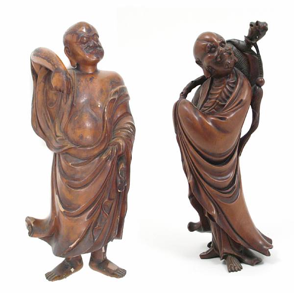 Appraisal: A Japanese lacquered wood figure of a monk inscription to