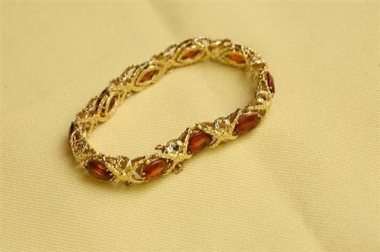 Appraisal: YELLOW GOLD CITRINE BRACELET Ten prong set oval citrine seperated