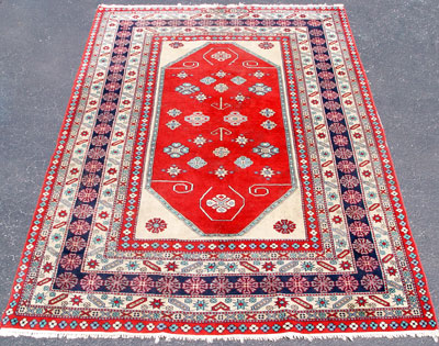 Appraisal: ORIENTAL CARPET Red ground with multiple borders Approx ' ''