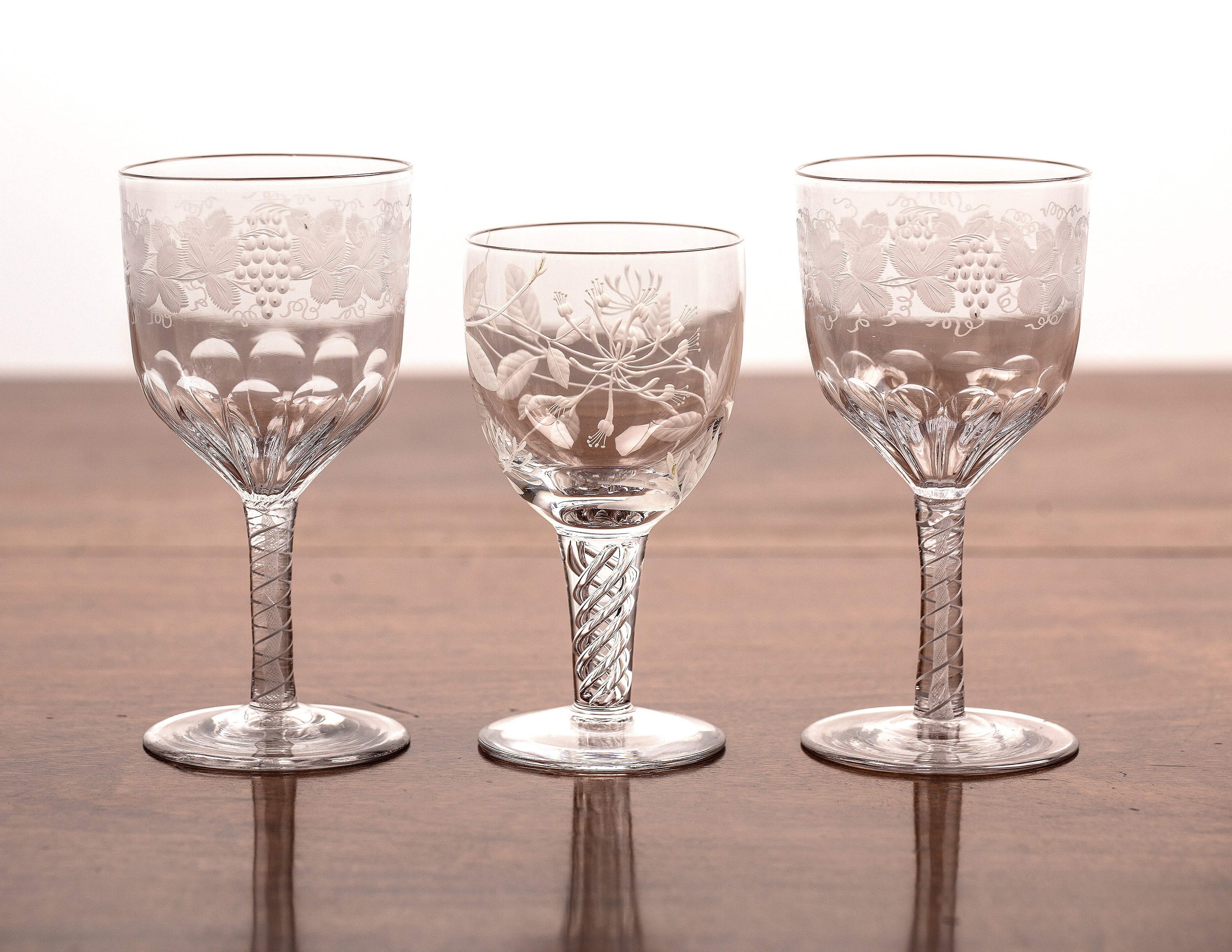 Appraisal: Three etched drinking glassescomprising of a pair of th Century