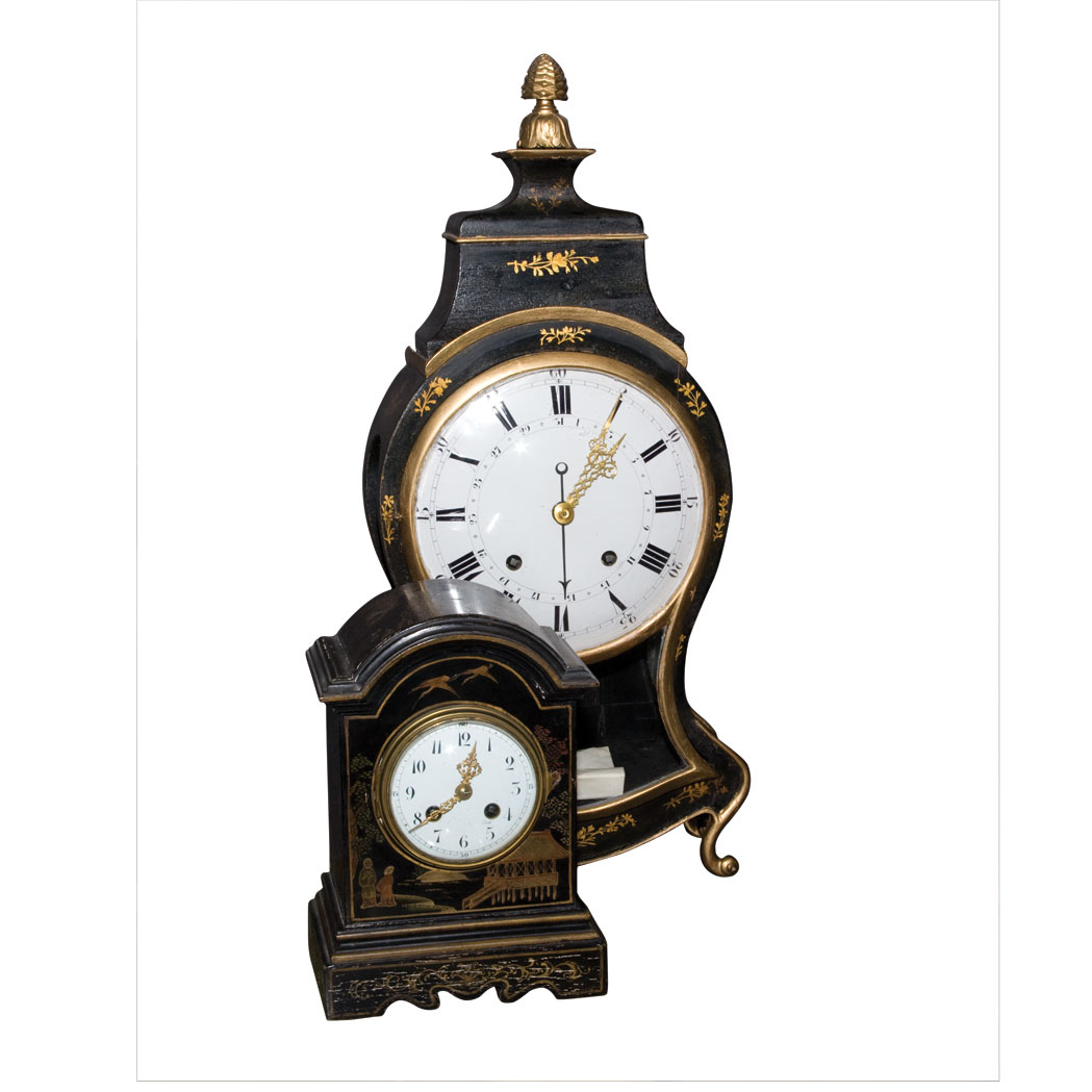 Appraisal: Two Regency Style Gilt Decorated Black Painted Mantel Clocks Height