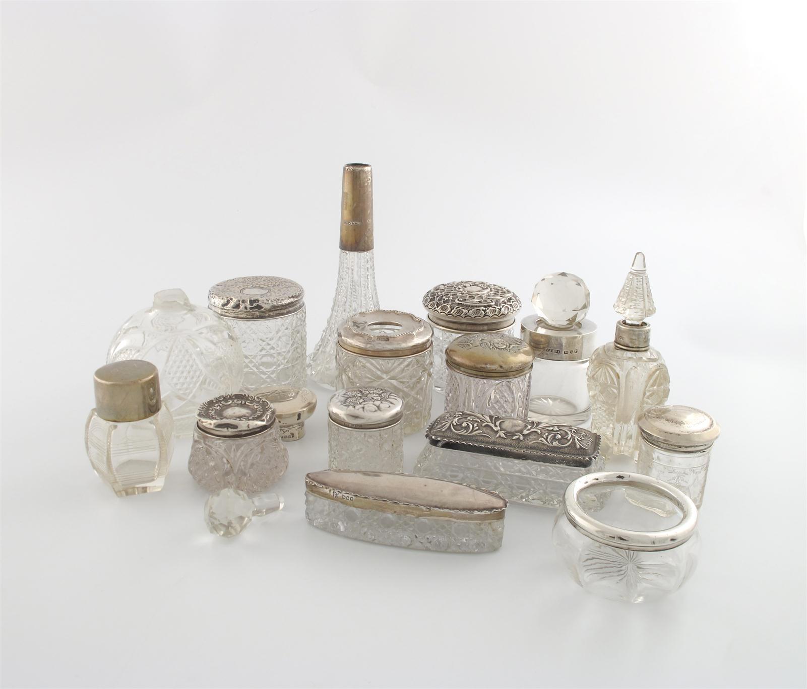 Appraisal: A collection of silver mounted cut glass scent bottles and