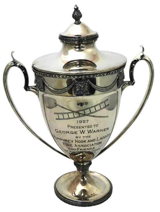 Appraisal: Fireman's silverplate trophy cup c presented by Humphrey Hook and