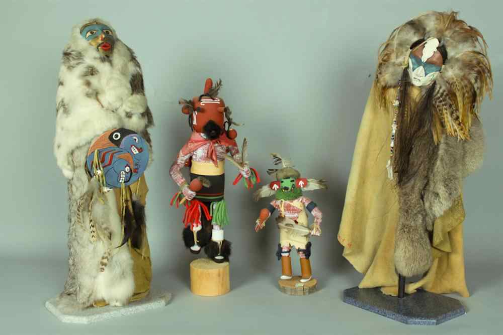 Appraisal: TWO LARGE KACHINA DOLLS TOGETHER WITH MUDHEAD KACHINE AND KACHINA