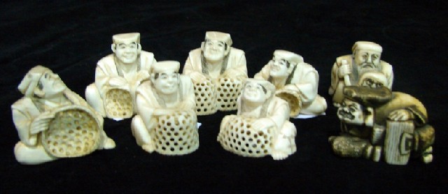 Appraisal: Eight various Japanese netsukes in carved ivory of seated fisherman