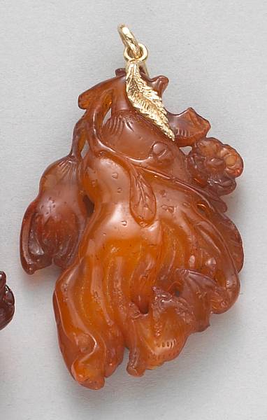 Appraisal: An carved amber Buddha's hand citron plaque th Century Of