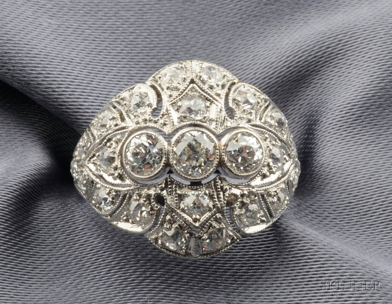 Appraisal: Art Deco Platinum and Diamond Ring the piercework form bezel