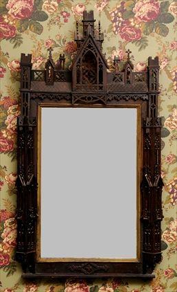 Appraisal: GOTHIC REVIVAL WALL MIRROR The rectangular mirror plate in conforming