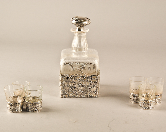 Appraisal: A Continental Silver Glass Cordial Set a blown and engraved