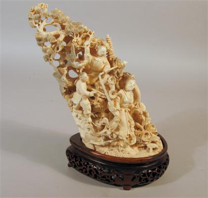 Appraisal: Chinese elephant ivory grouping Of arched tusk form well carved