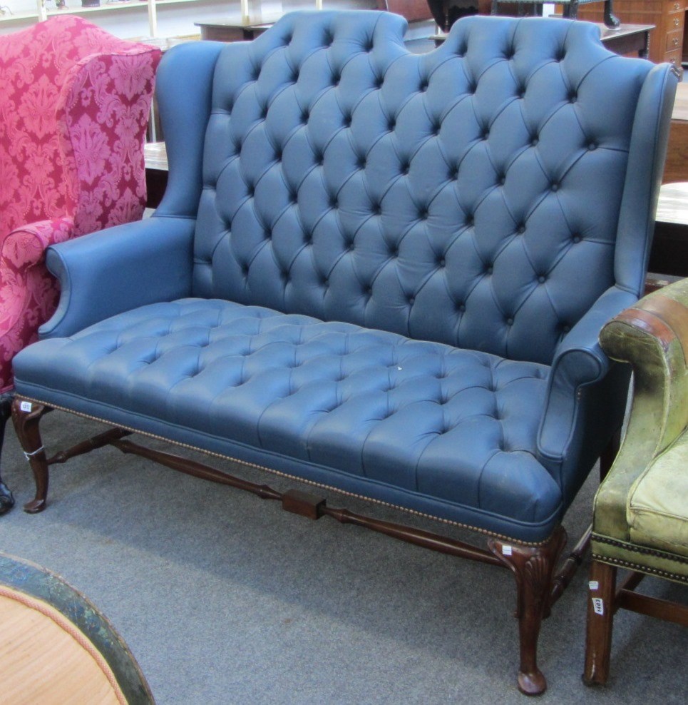 Appraisal: A Queen Anne design blue leather upholstered button backed sofa