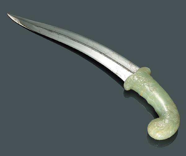 Appraisal: A mughal dagger with carved nephrite handle The sharp-edged blade