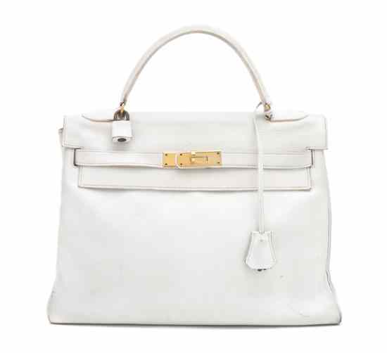 Appraisal: An Hermes White Leather Kelly Bag with gold hardware blindstamp