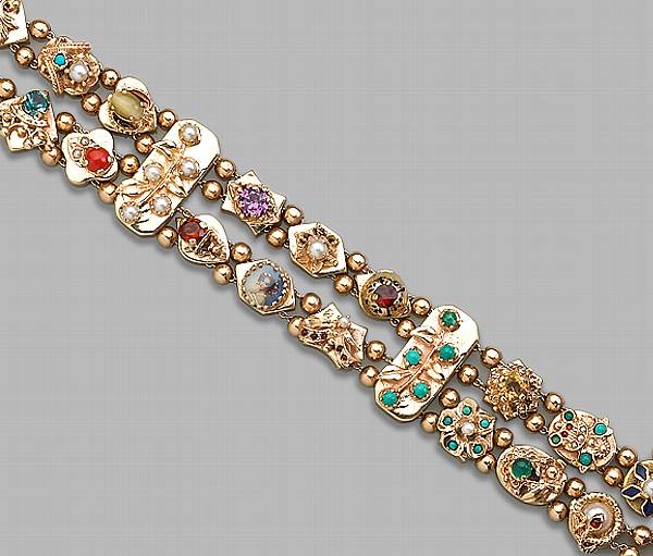 Appraisal: A gem-set four row slider bracelet comprising twenty-one slides fourteen