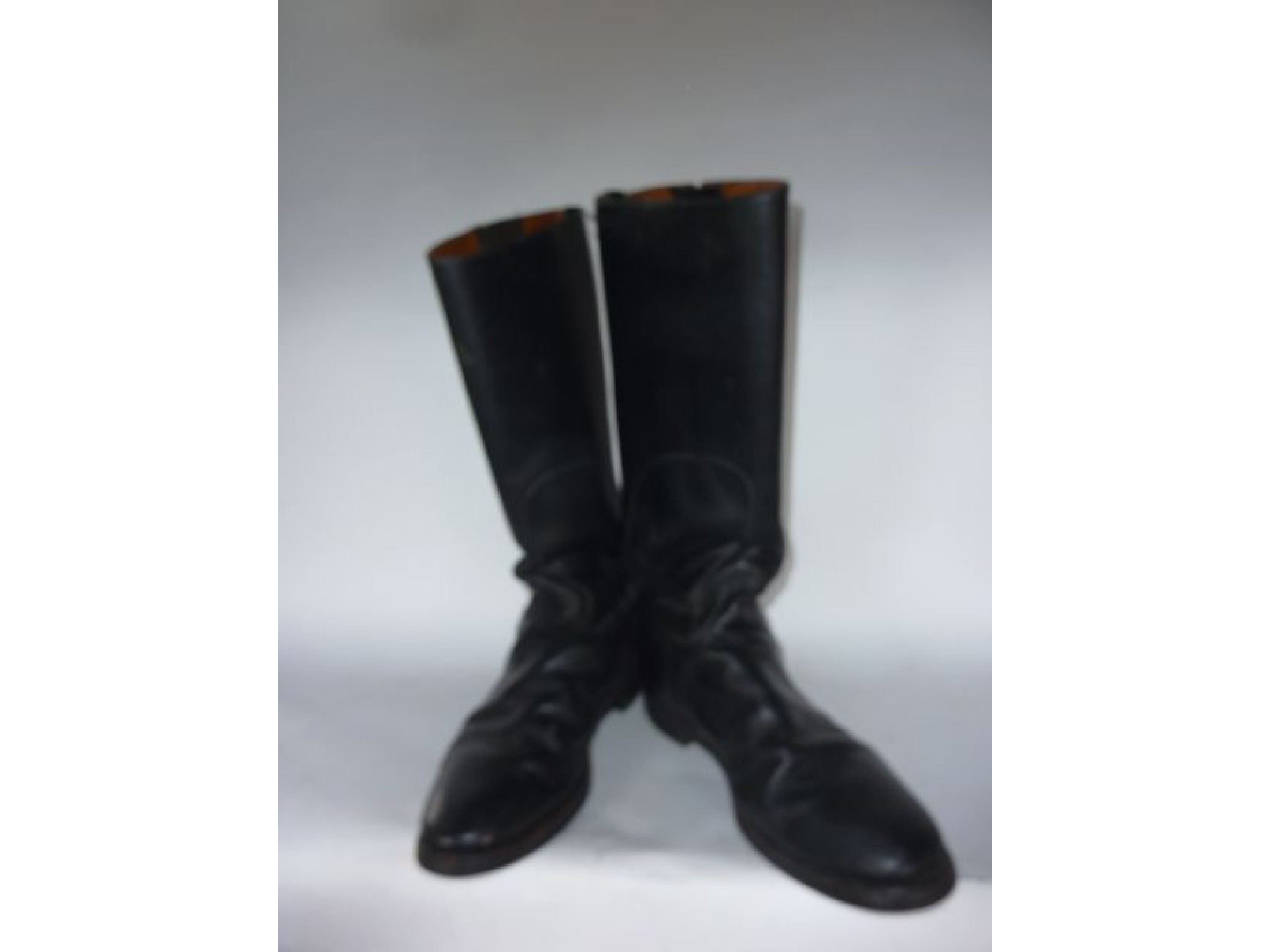 Appraisal: A contemporary pair of English black leather riding boots marked