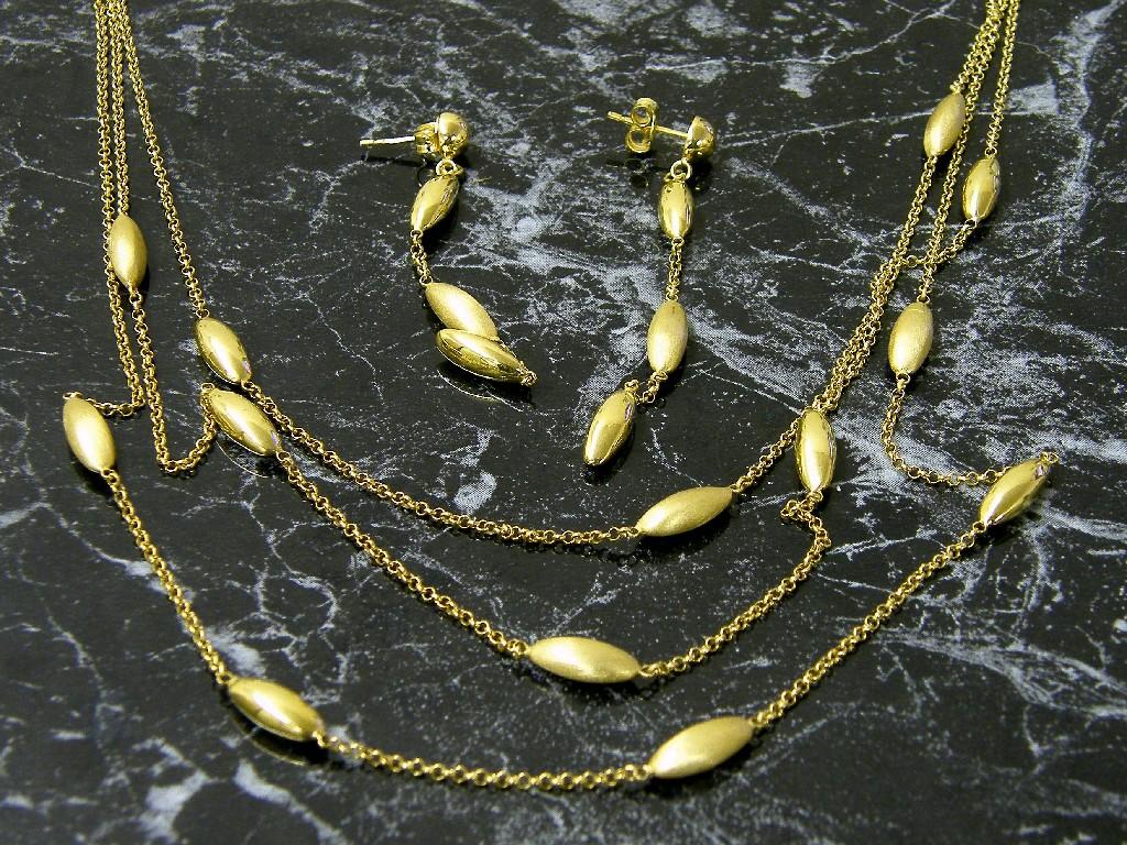 Appraisal: ct three row necklet and matching earrings gm