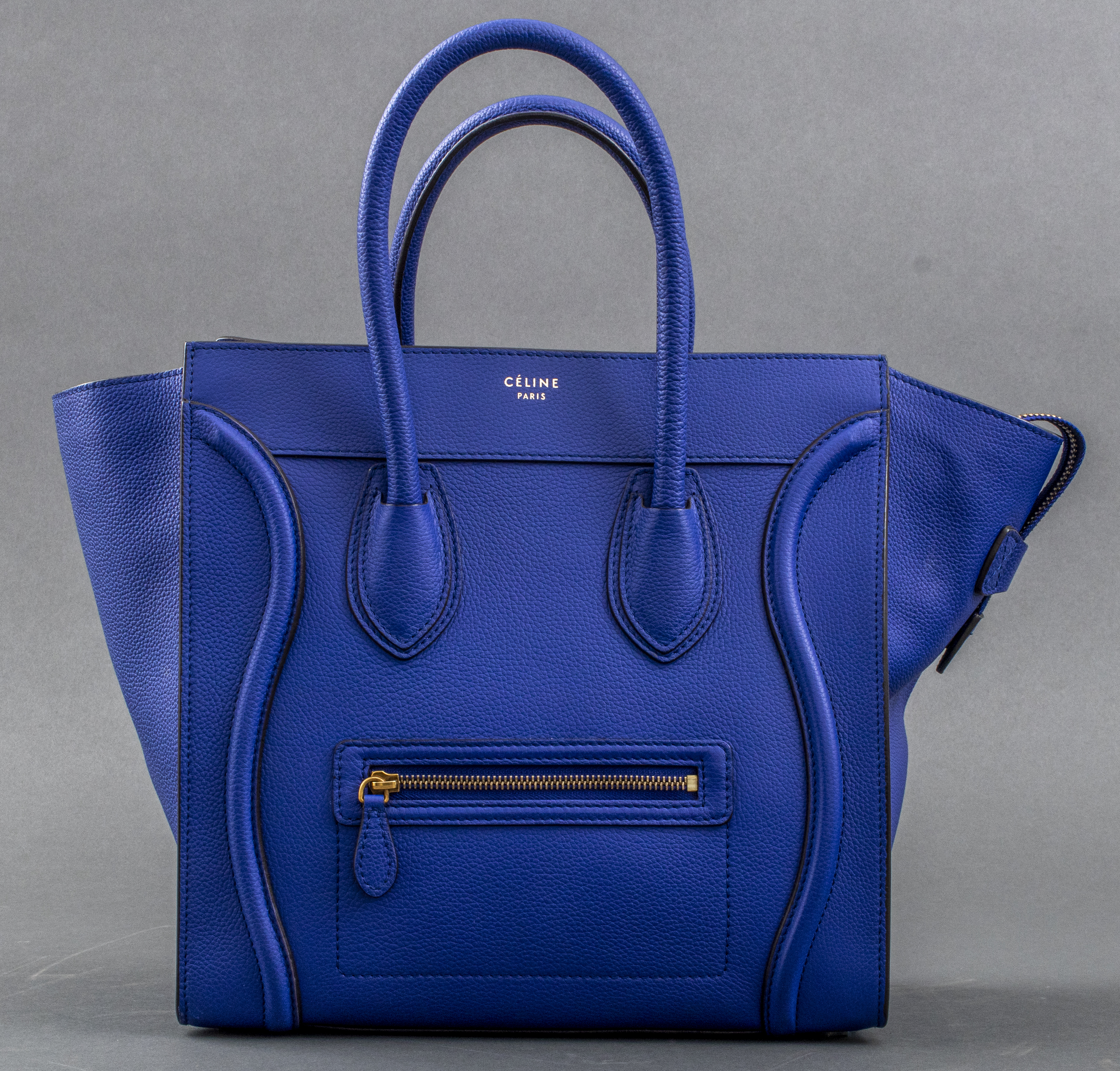 Appraisal: CELINE ELECTRIC BLUE CALFSKIN LUGGAGE HANDBAG Celine calfskin mini luggage