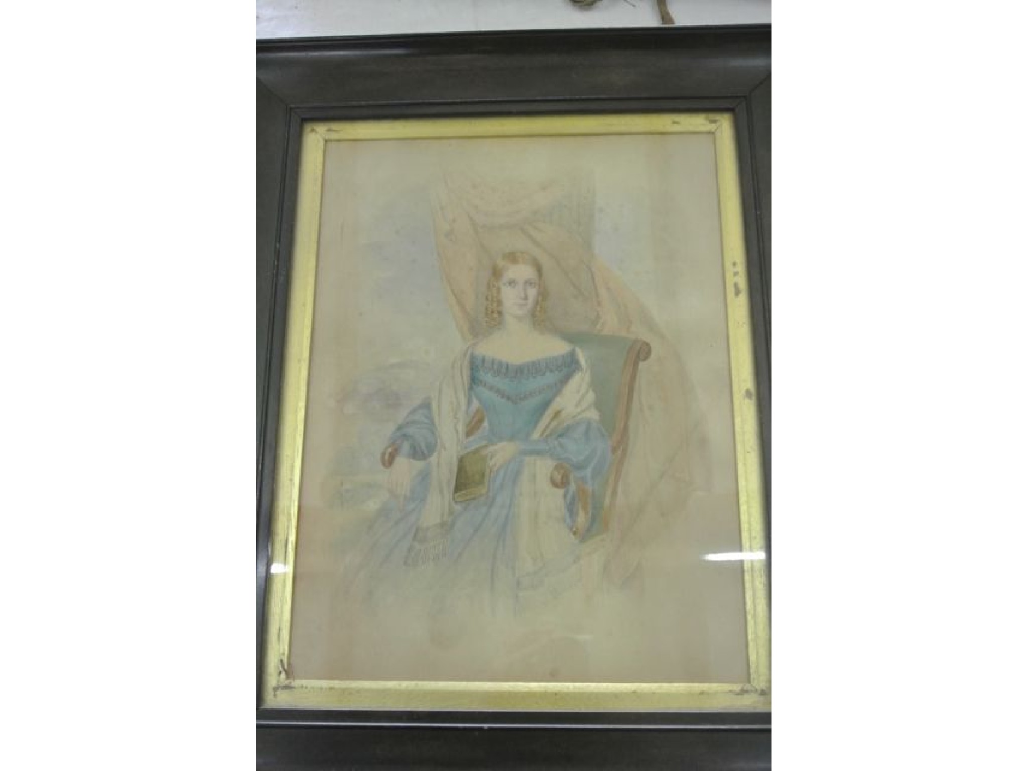 Appraisal: A Victorian watercolour three quarter length portrait of a seated