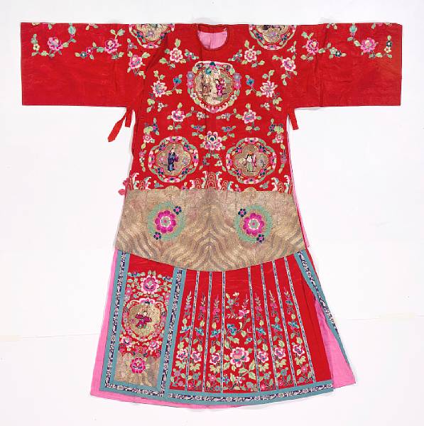 Appraisal: A red silk ground embroidered coat and skirt th Century