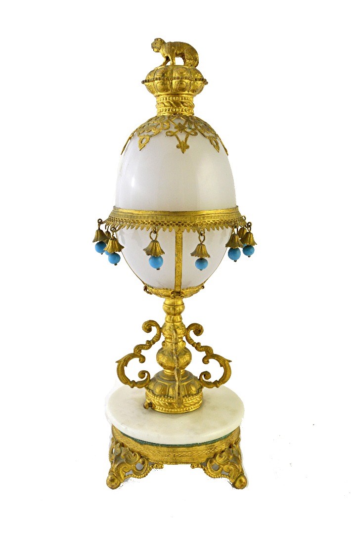 Appraisal: An early th century gilt metal and opaque glass mounted