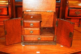 Appraisal: A walnut jewellery box with brass mounts