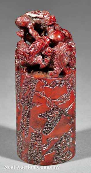 Appraisal: A Chinese Red Soapstone Seal cylindrical body surmounted by three