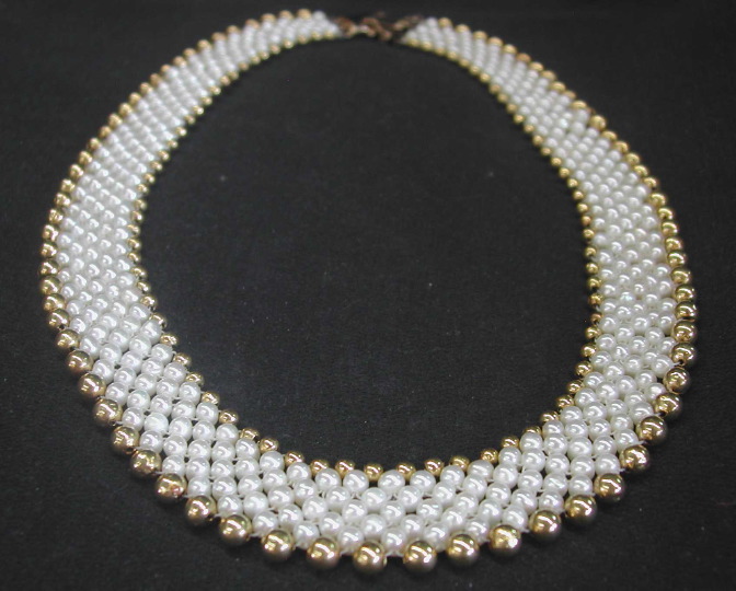 Appraisal: Fourteen-Karat Yellow Gold and Cultured Pearl Necklace composed of two