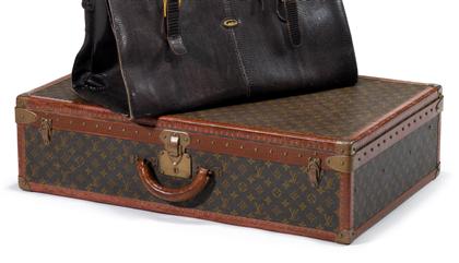 Appraisal: Louis Vuitton hard sided suitcase late th century With the