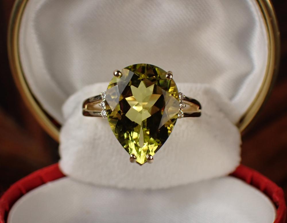 Appraisal: LEMON QUARTZ DIAMOND AND FOURTEEN KARAT GOLD RING The k