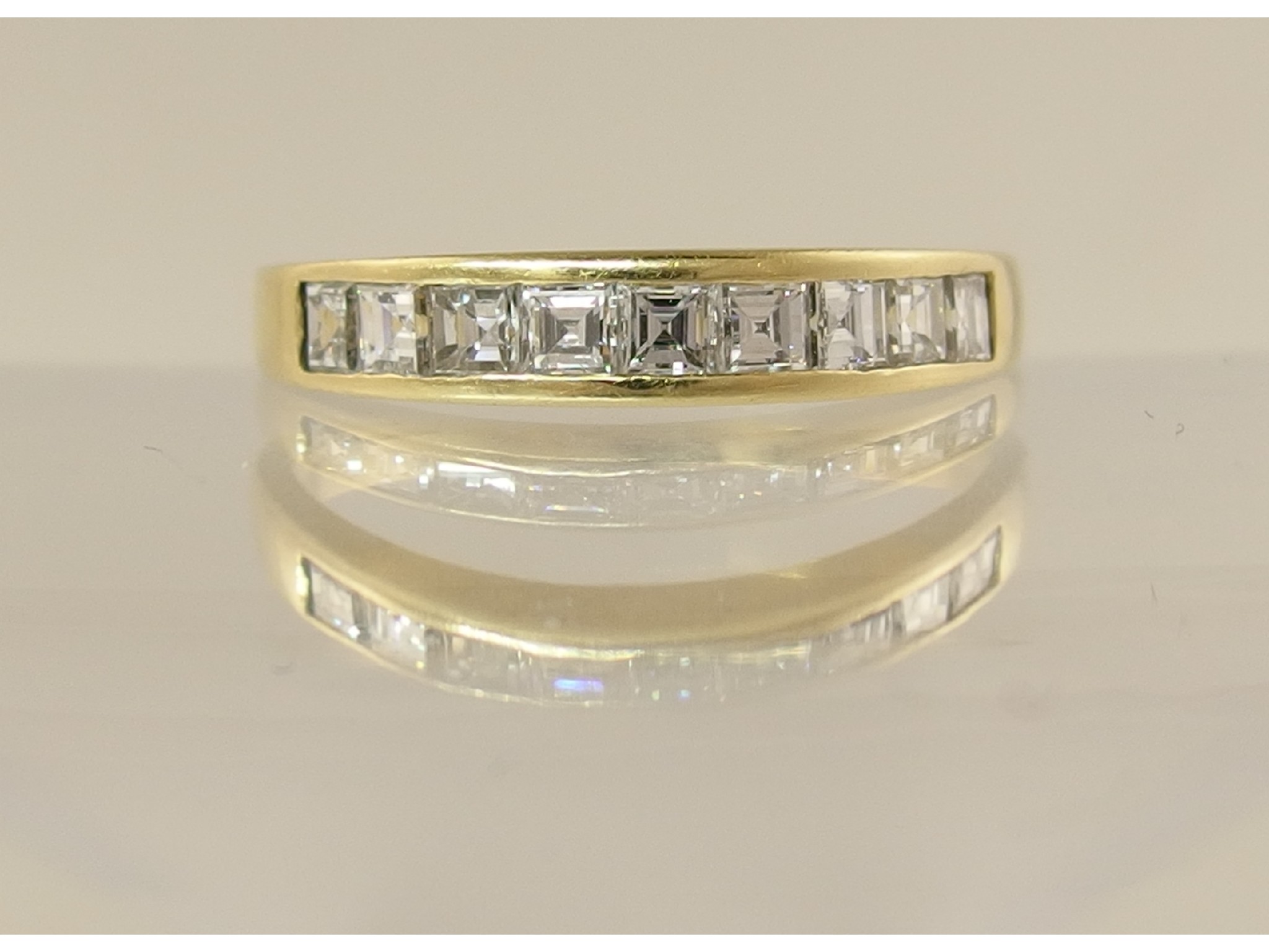 Appraisal: An ct yellow gold diamond set eternity ringset with nine