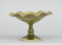 Appraisal: Quezal-style Footed Compote circa th Century Iridescent glass compote with