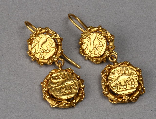 Appraisal: A PAIR OF DROP EARRINGS in the form of middle