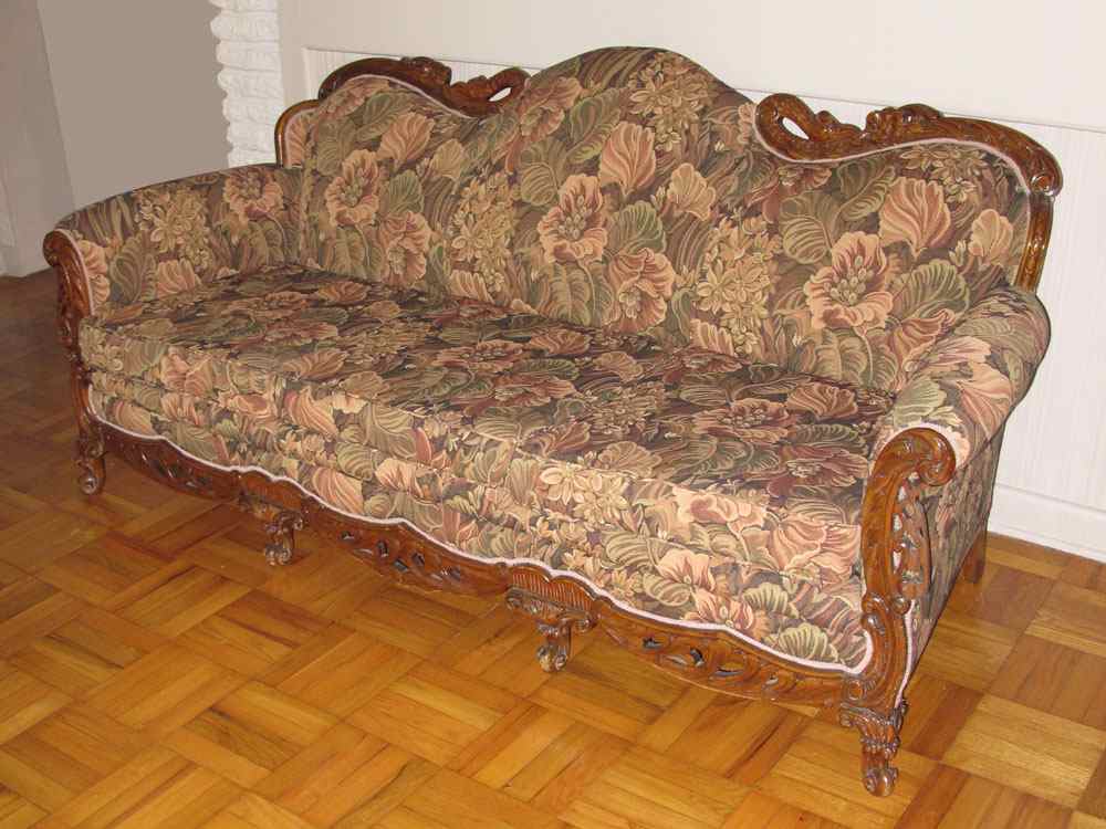 Appraisal: 'S FRENCH STYLE OVERSTUFFED SOFA Ornately carved with birds in