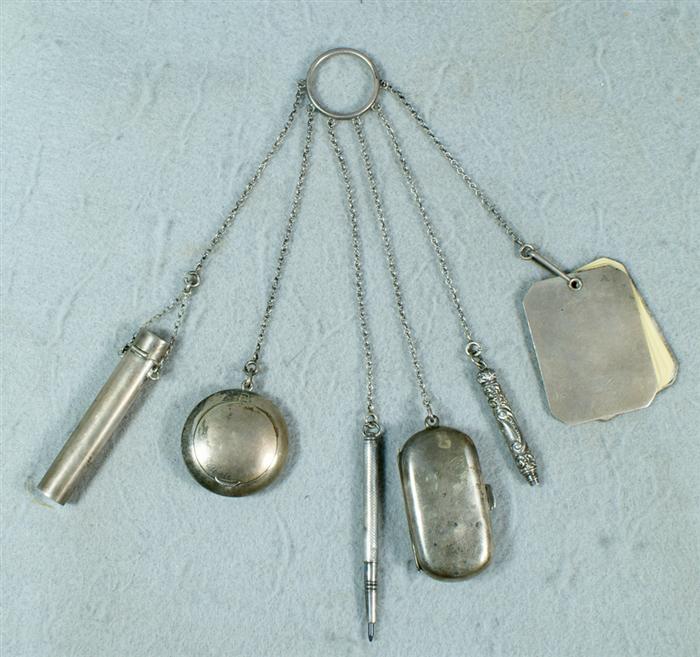 Appraisal: Sterling silver chatelaine with attachments with a sterling silver compact