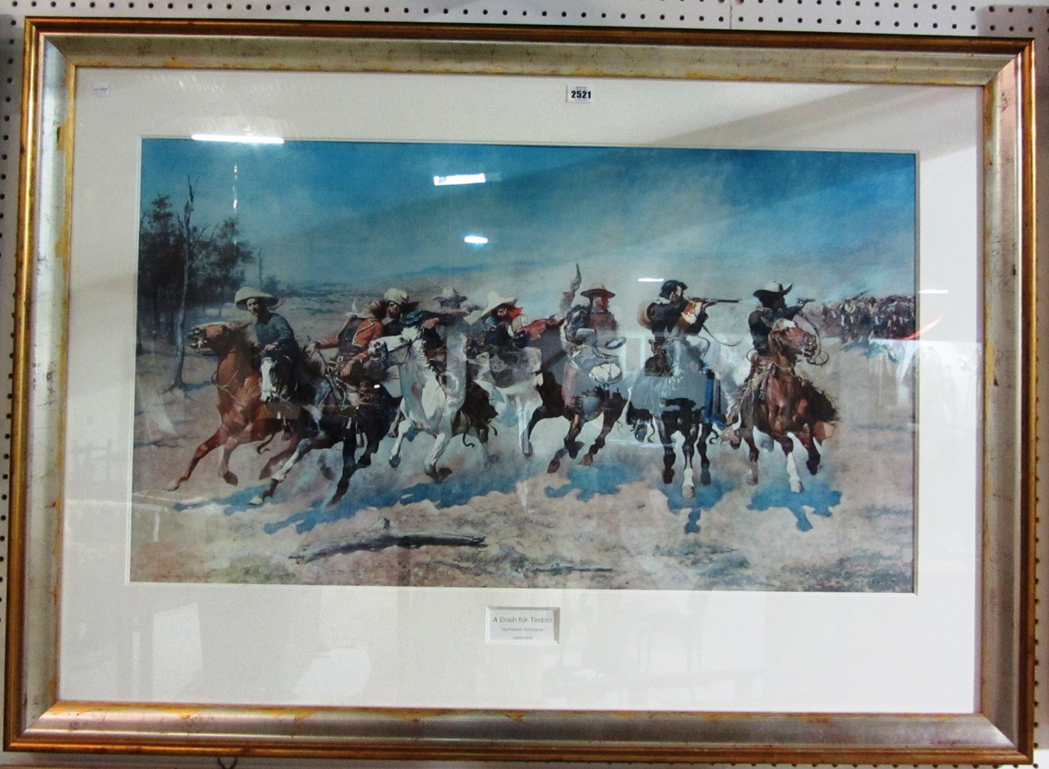 Appraisal: A limited edition Remington print of Cowboys and two other