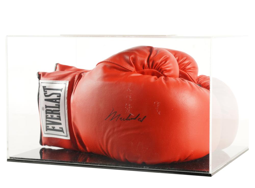 Appraisal: PAIR OF MOHAMMAD ALI SIGNED BOXING GLOVESsigned Mohammad Ali in