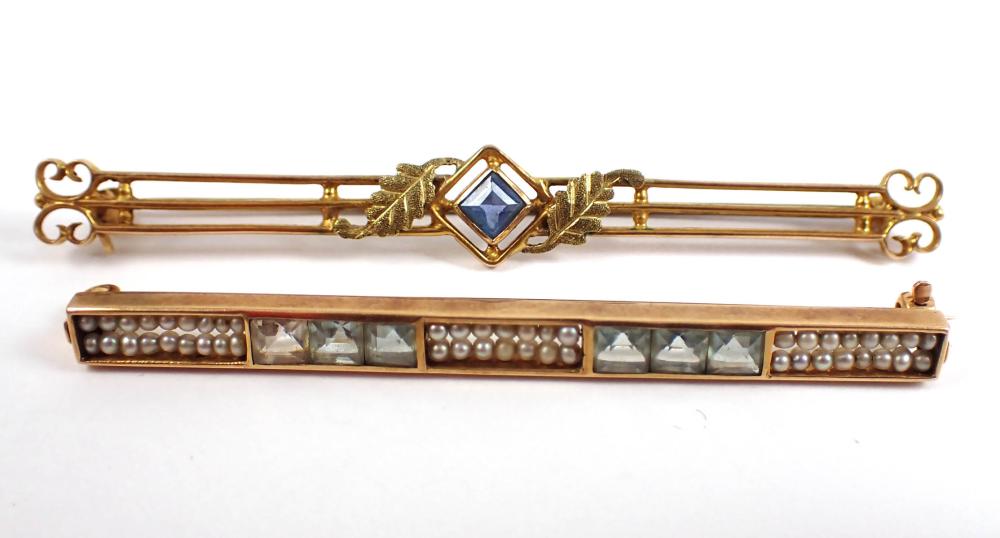 Appraisal: TWO COLORED GEMSTONE AND YELLOW GOLD BAR PINS including a