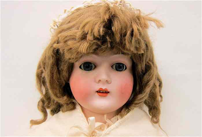 Appraisal: GERMAN BISQUE SHOULDER HEAD GIRL DOLL marked and within triangle