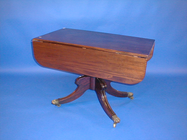 Appraisal: A Regency mahogany Pembroke table with drop leaves turned column