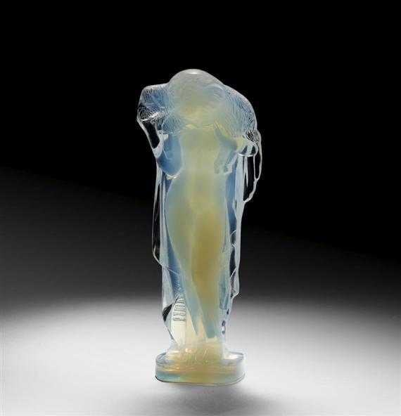 Appraisal: SABINO FRANCE FIGURINE circa Mould-pressed white opalescent glass Signed SABINO