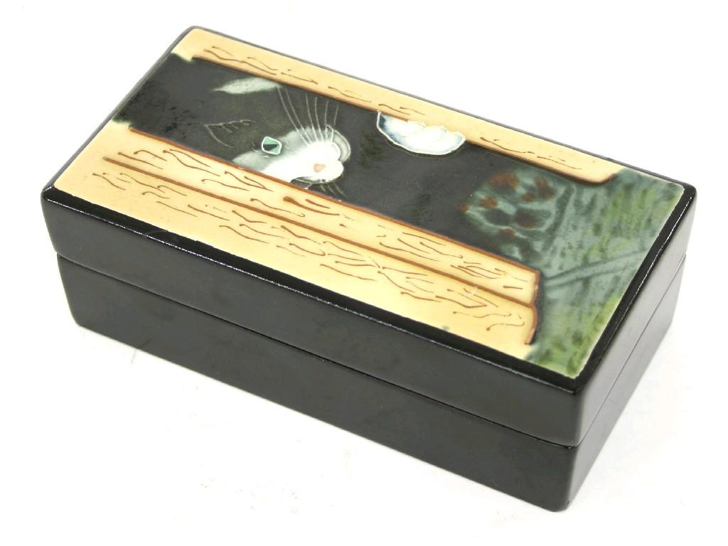 Appraisal: Interesting black lacquer rectangular box and cover the lid decorated