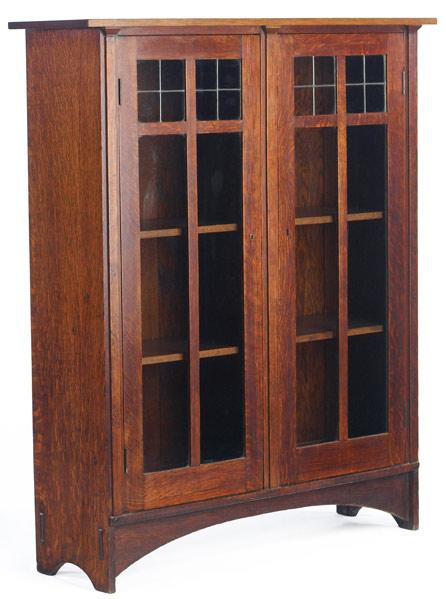 Appraisal: GUSTAV STICKLEY Double-door bookcase no designed by Harvey Ellis with