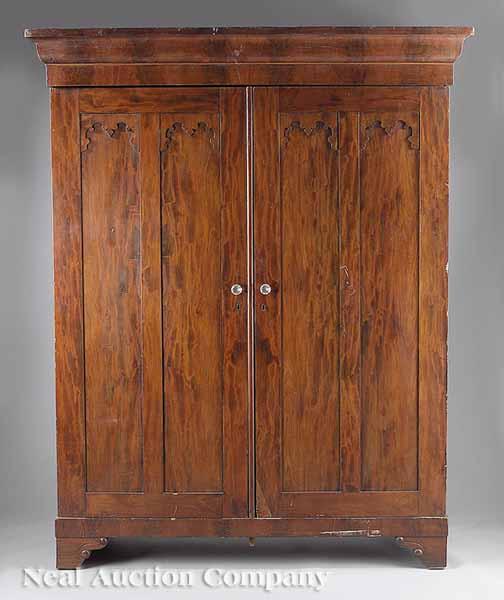 Appraisal: An American Late Classical Mahogany Armoire c ogee molded cornice