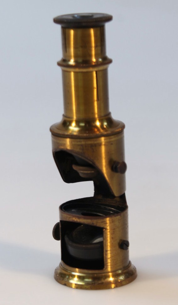 Appraisal: A late thC lacquered brass pocket microscope cm high