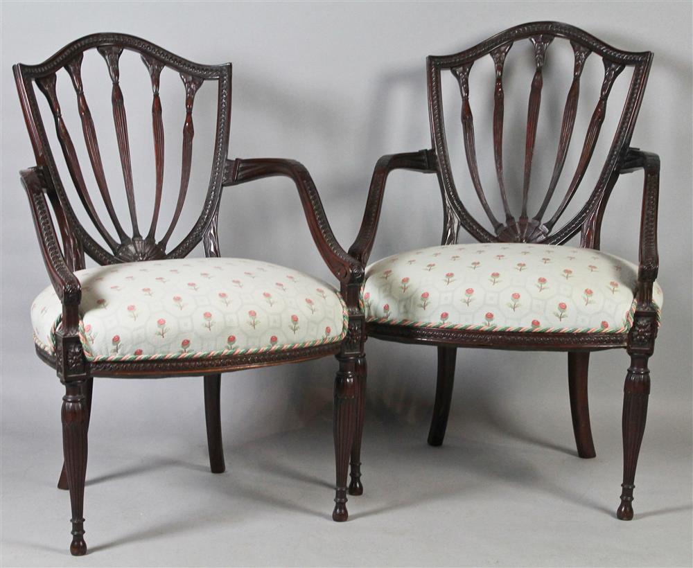 Appraisal: PAIR OF ADAM STYLE CARVED MAHOGANY ARM CHAIRS each having