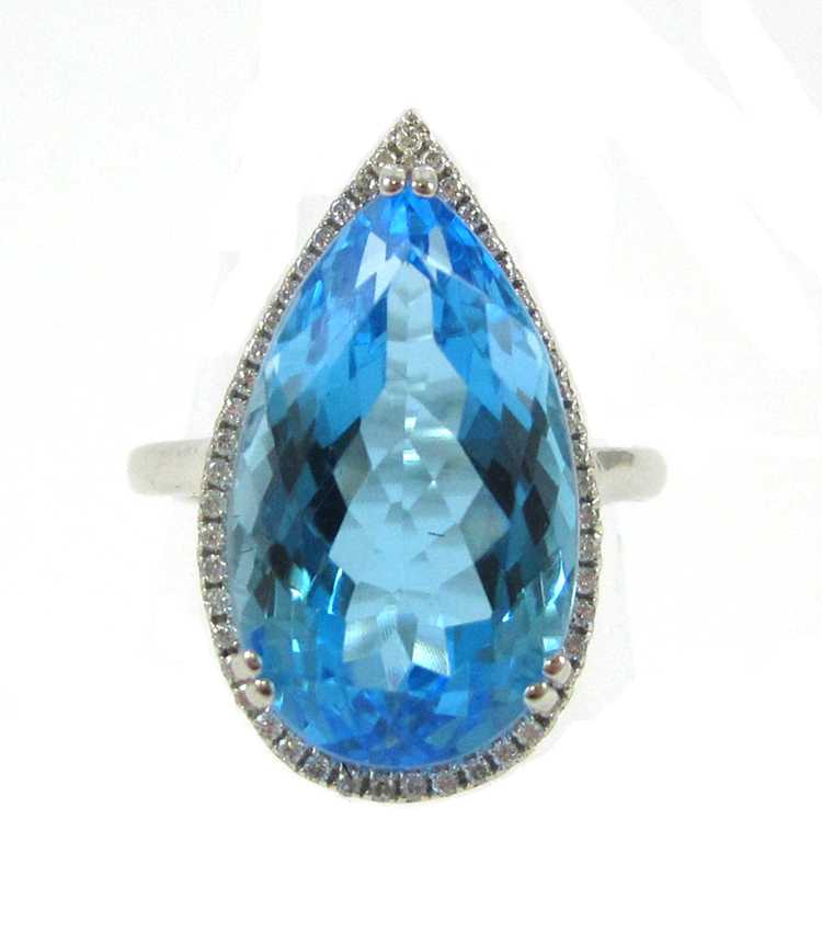 Appraisal: BLUE TOPAZ DIAMOND AND WHITE GOLD RING The k white