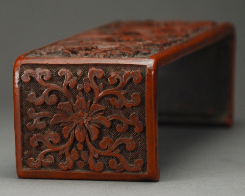 Appraisal: Deeply carved design of lotus bloom flanked by pair of