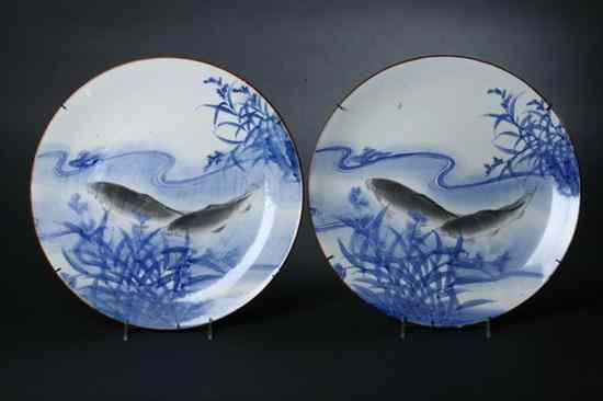 Appraisal: PAIR JAPANESE BLUE AND GRISAILLE PORCELAIN CHARGERS Meiji period Paint