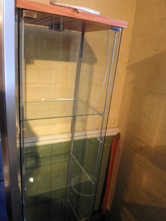 Appraisal: A pair of glazed display cabinets